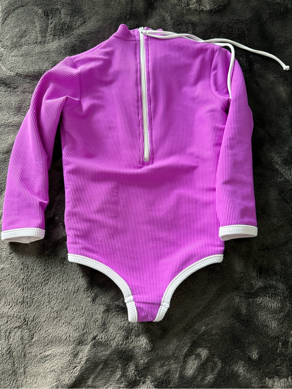 LainSnow Kids Long-Sleeve One-Piece Rashguard in Neon Purple with White Trim - Picture 2 of 5